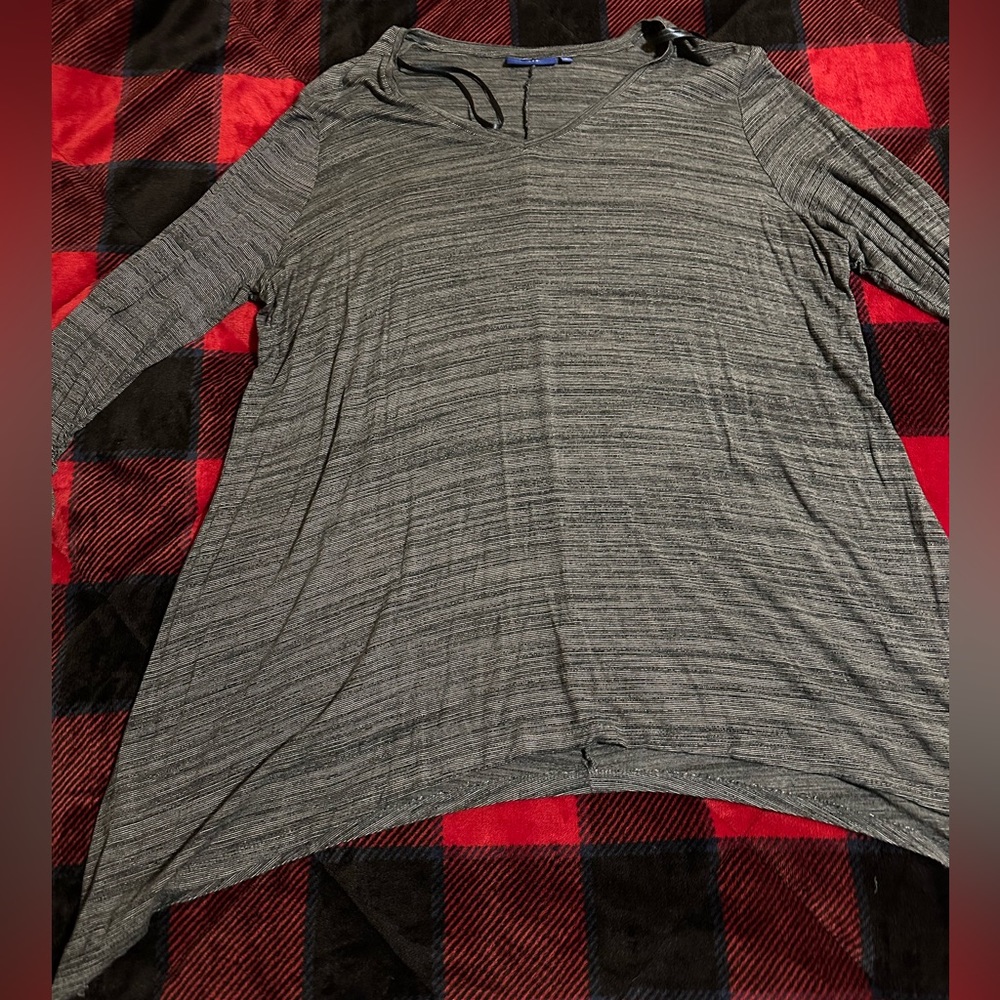 3/4 sleeve top with shark bite sides